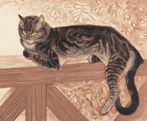 A tabby cat rests on a wooden railing.