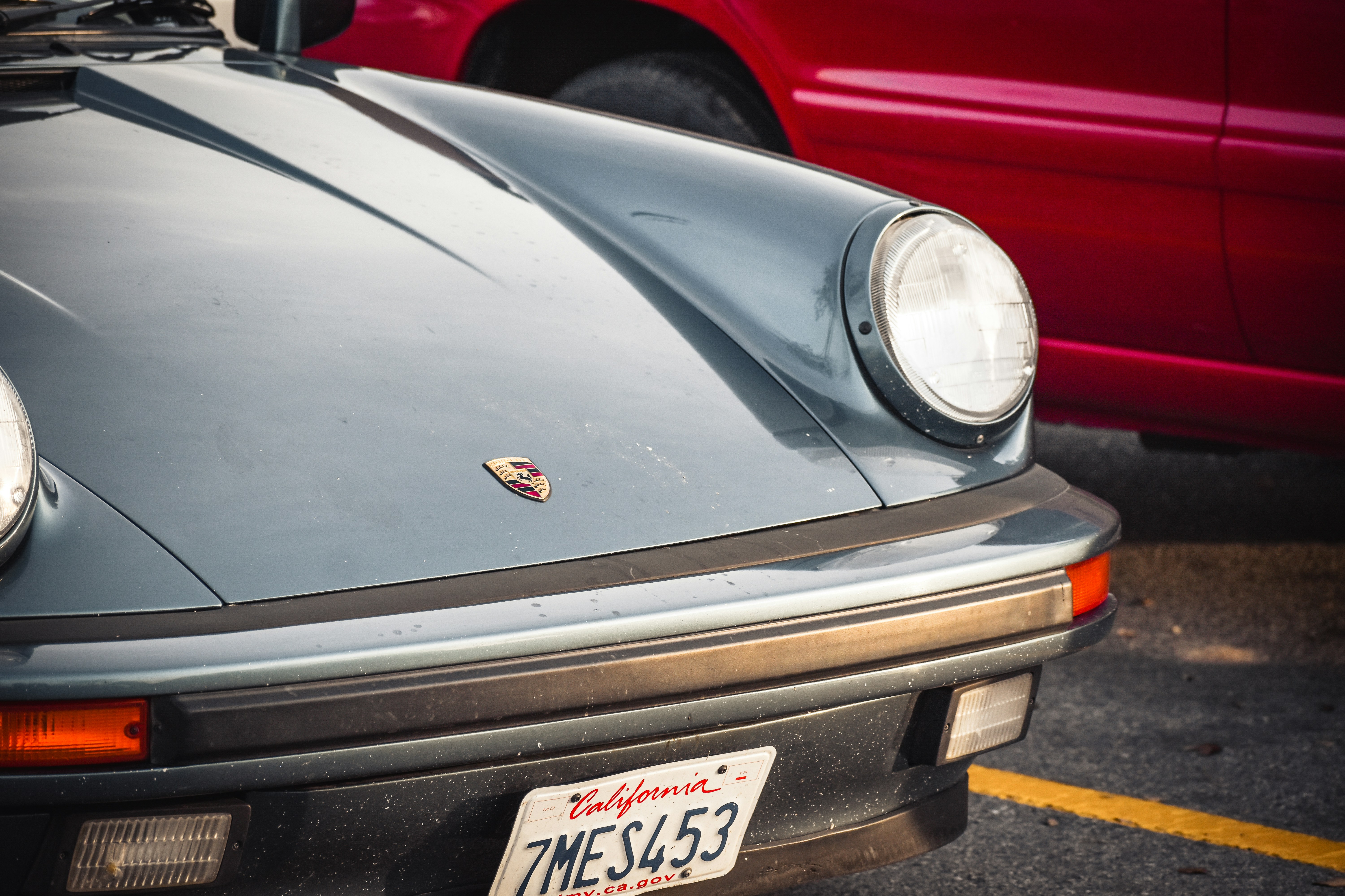 A close up of a car parked in a parking lot