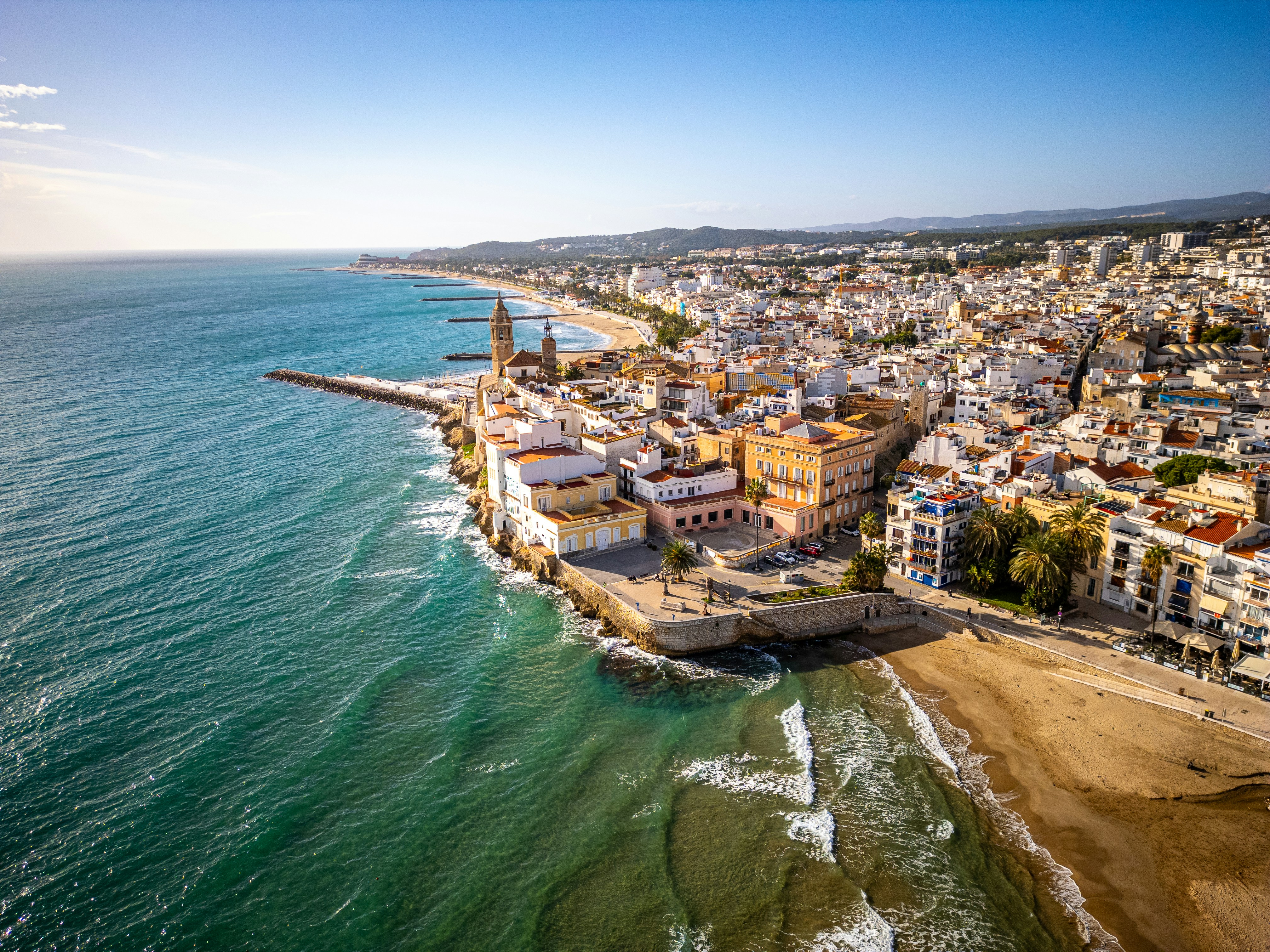 An aerial view of a city by the ocean