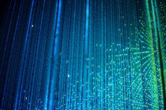 A shower head with a lot of water coming out of it