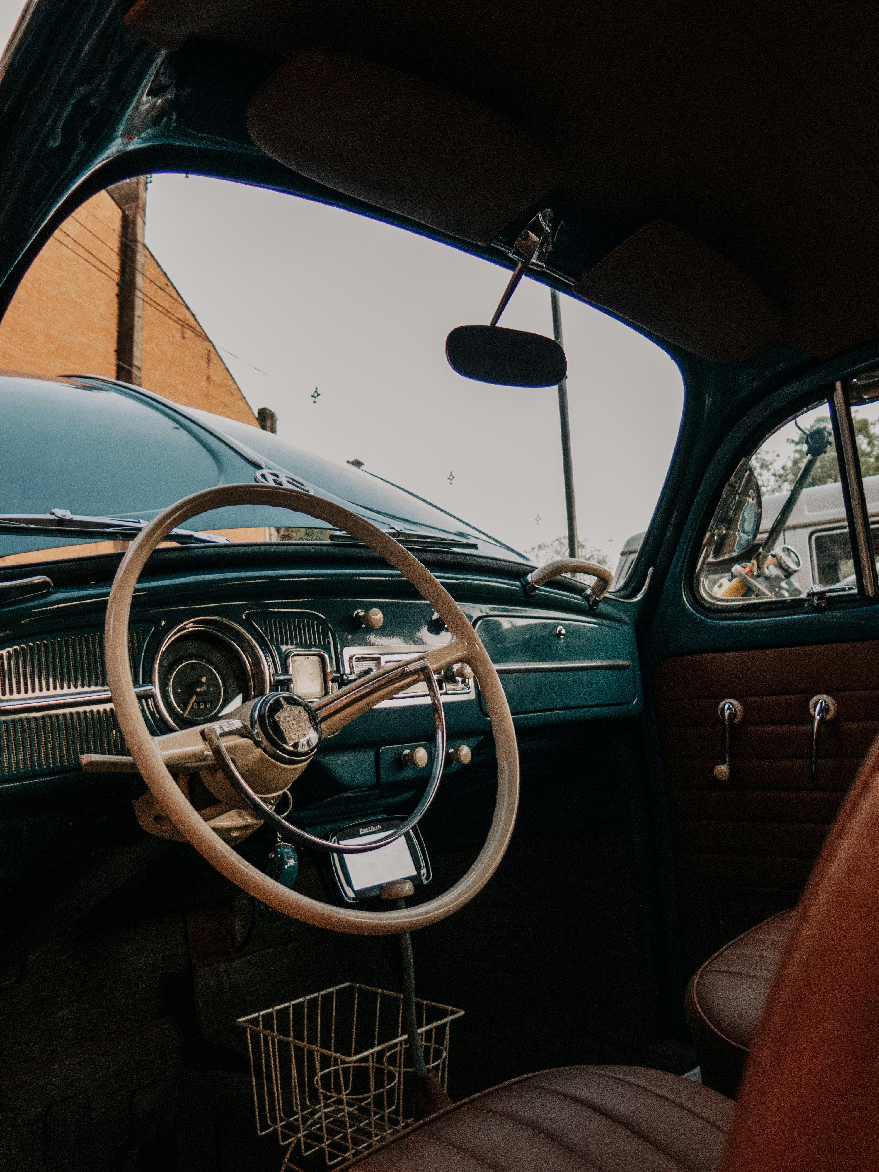 The interior of a car with a steering wheel