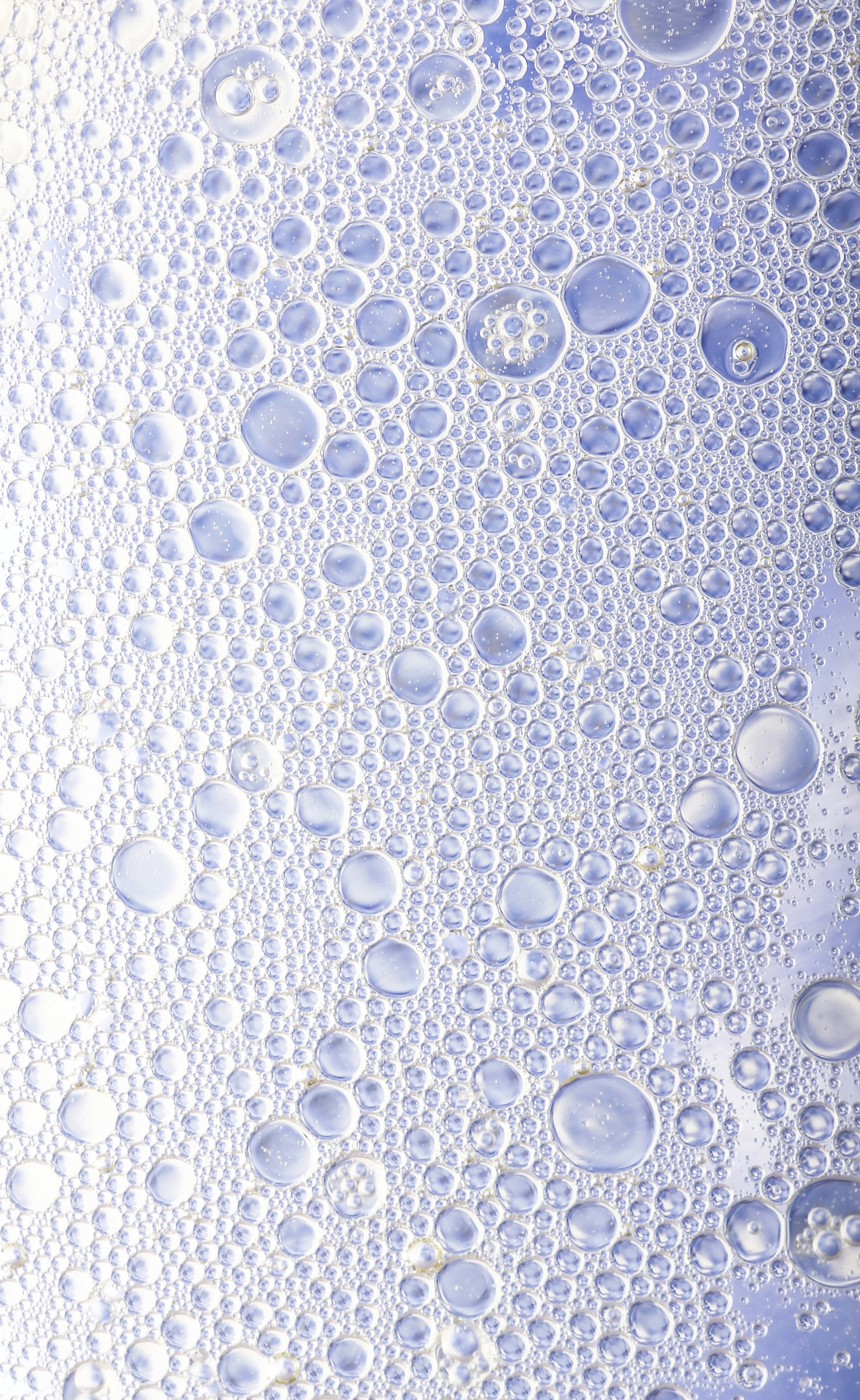 A close up of water bubbles on a surface