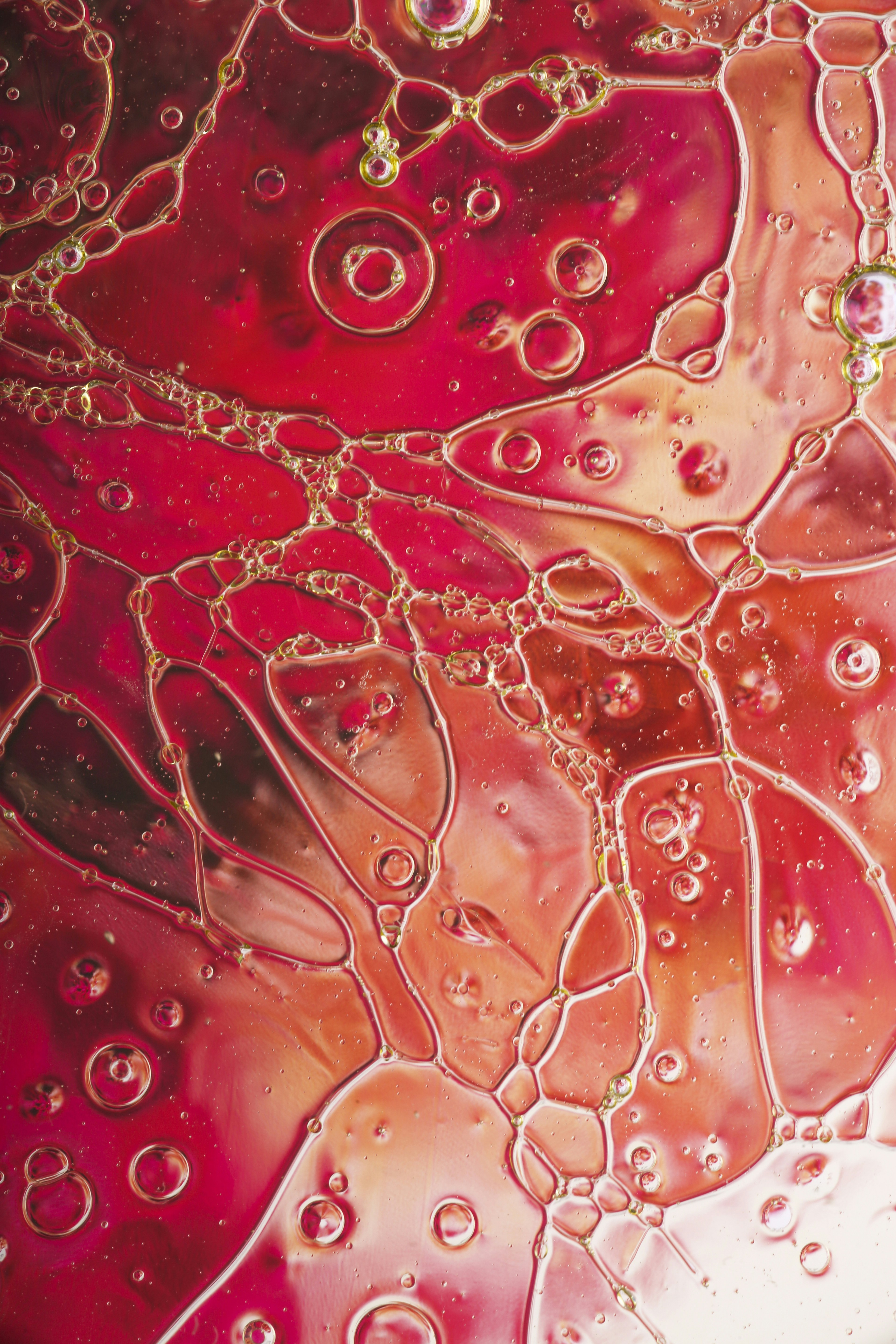 A close up of a red and yellow liquid