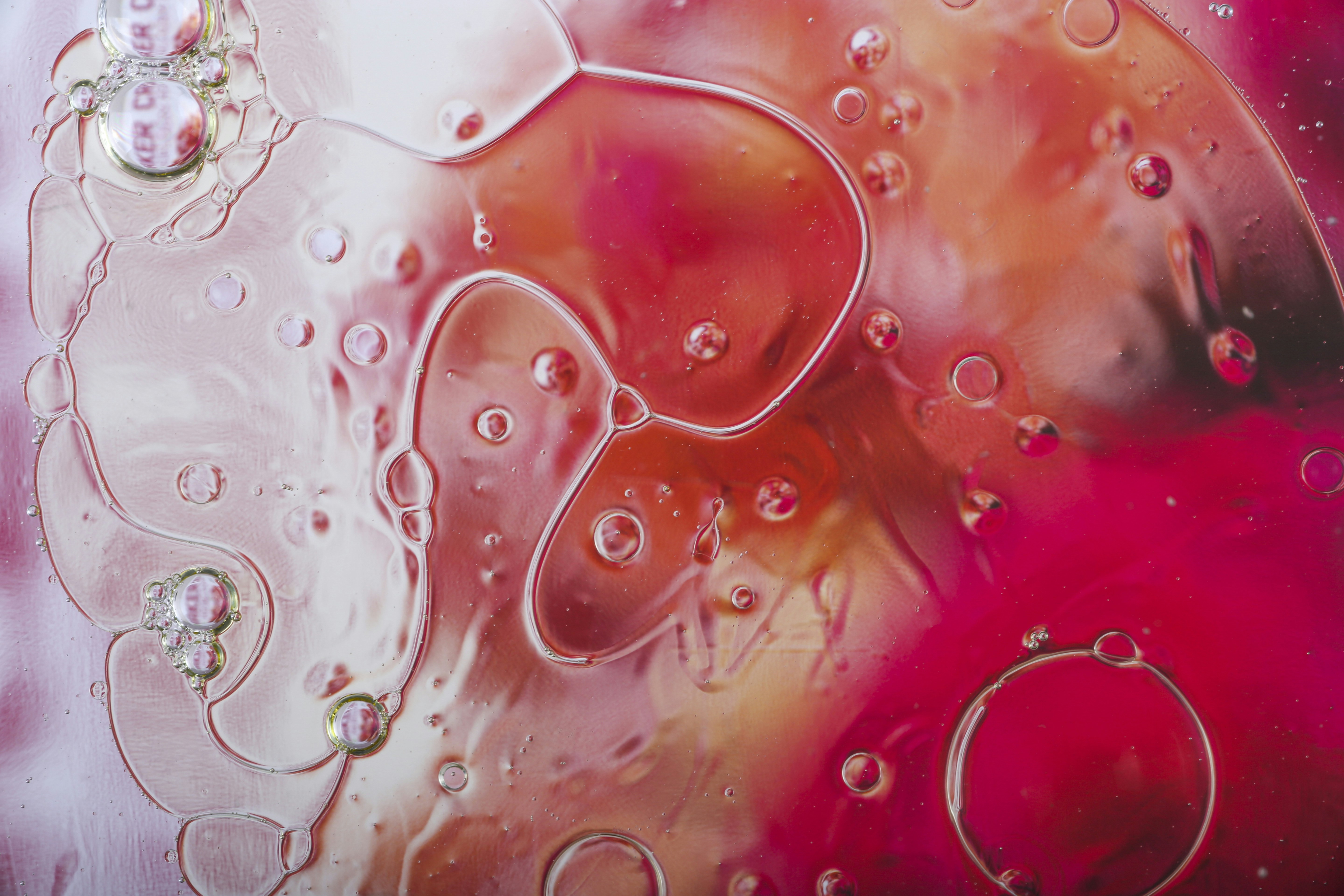 A close up picture of water droplets on a glass surface
