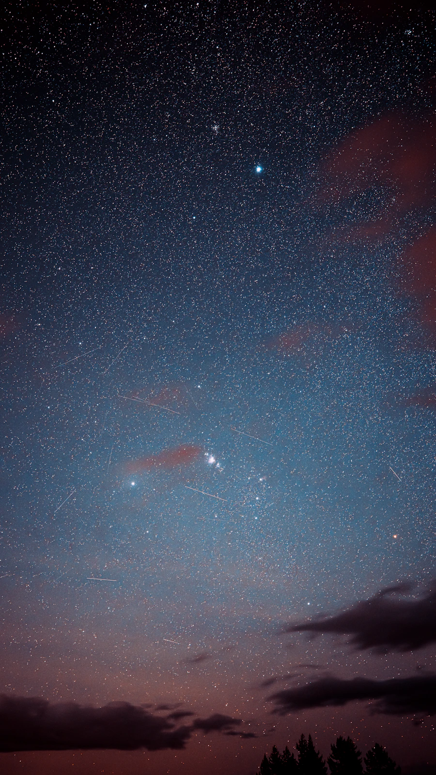 Night sky full of stars over Lake Tekapo, New Zealand
