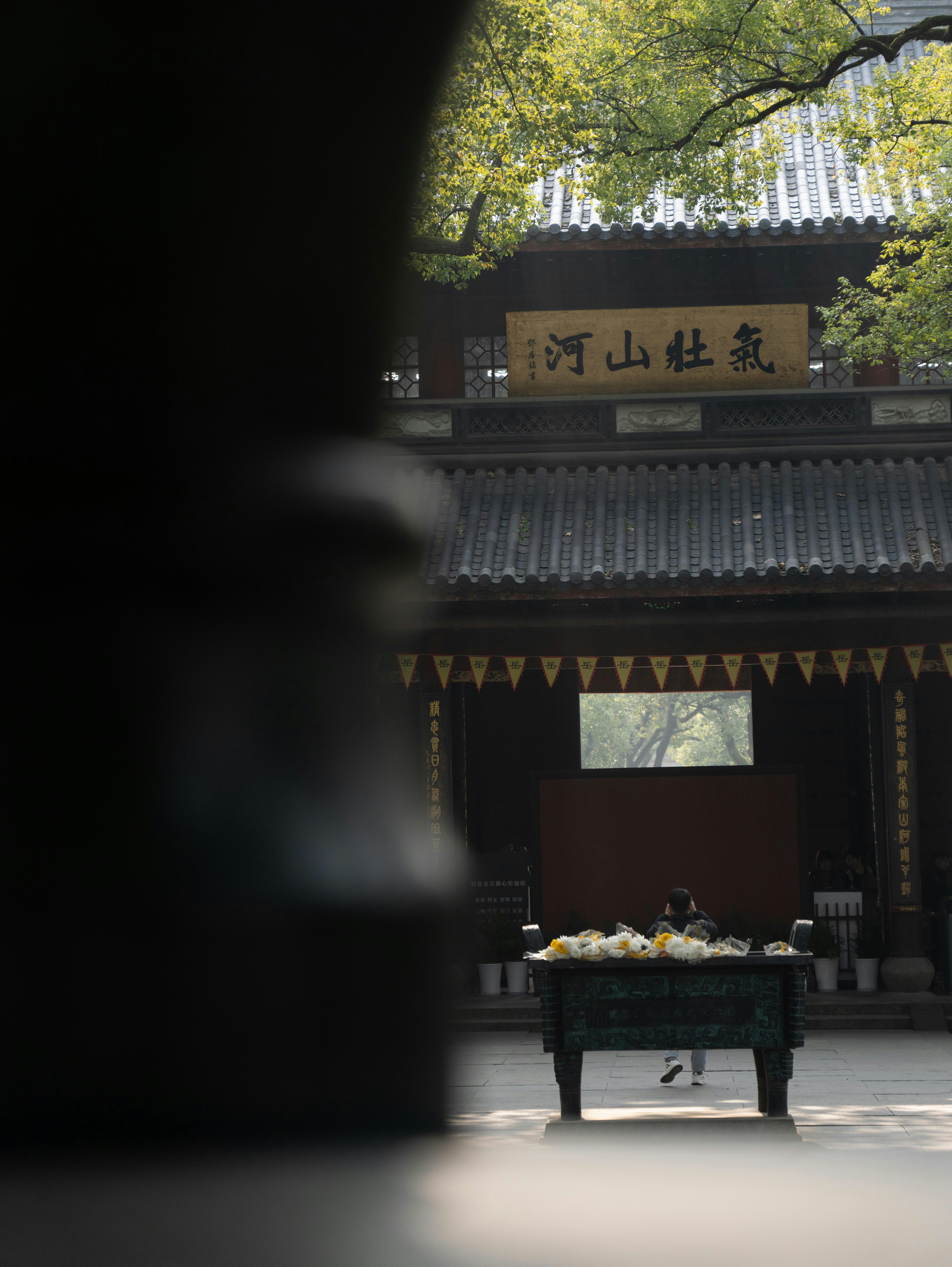 A small table with food on it in front of a building