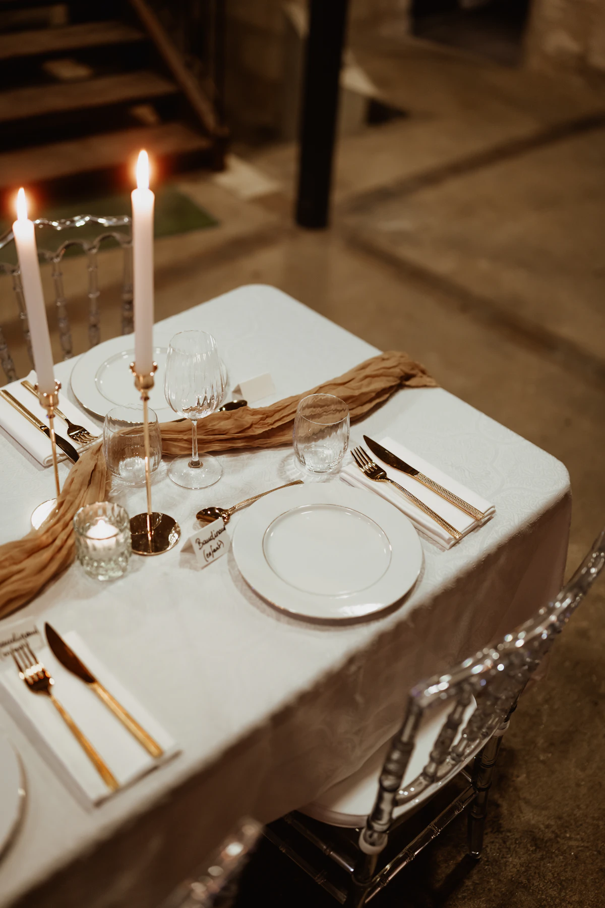 Romantic table setting with silverware and candles