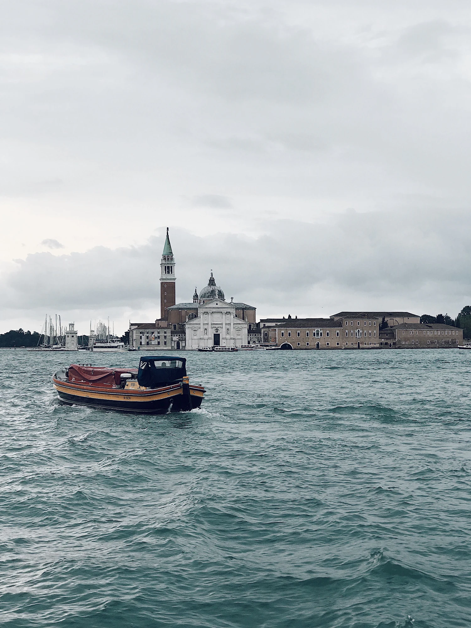A small boat on a wide stretch of water