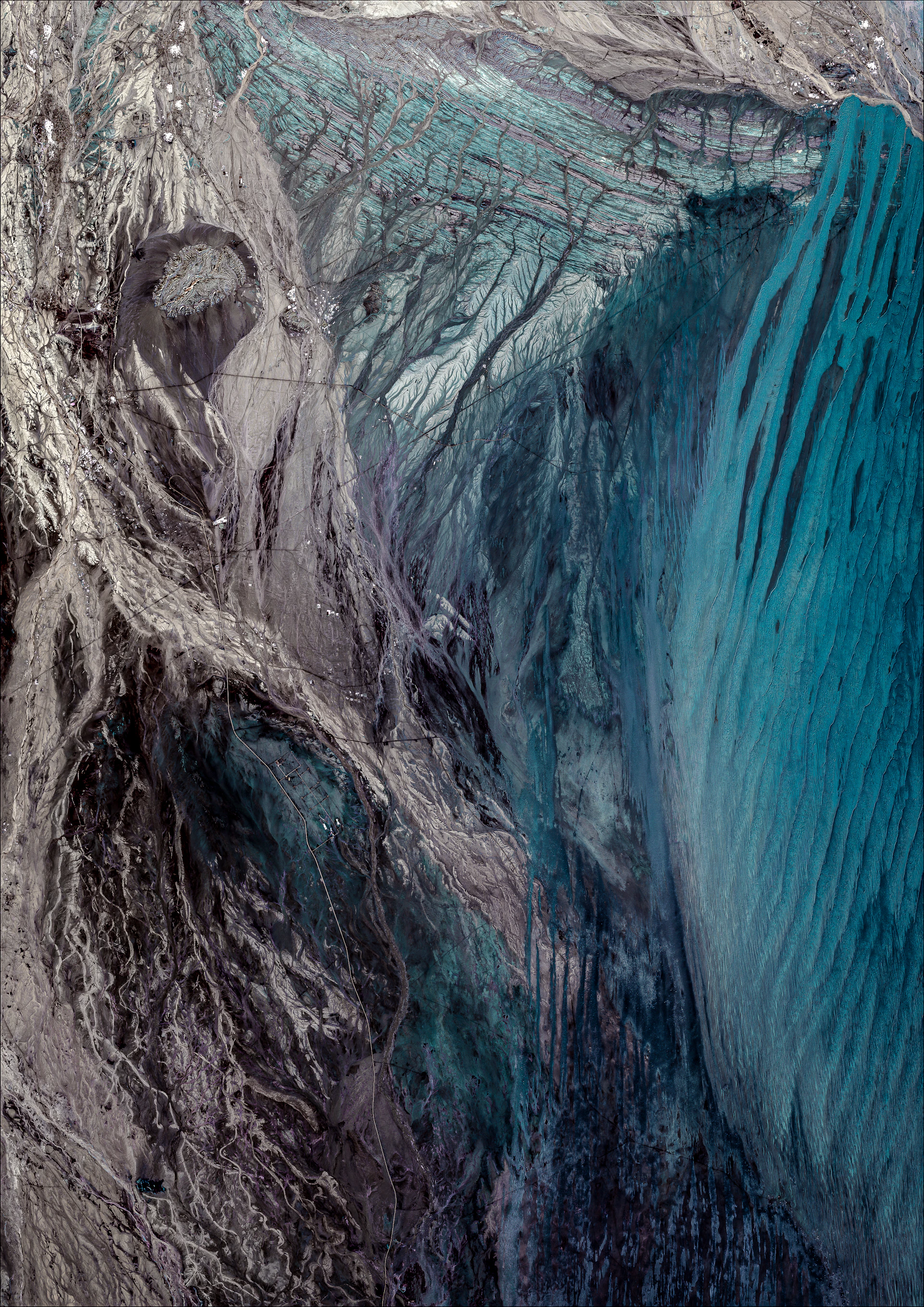 An abstract painting of a blue and black waterfall