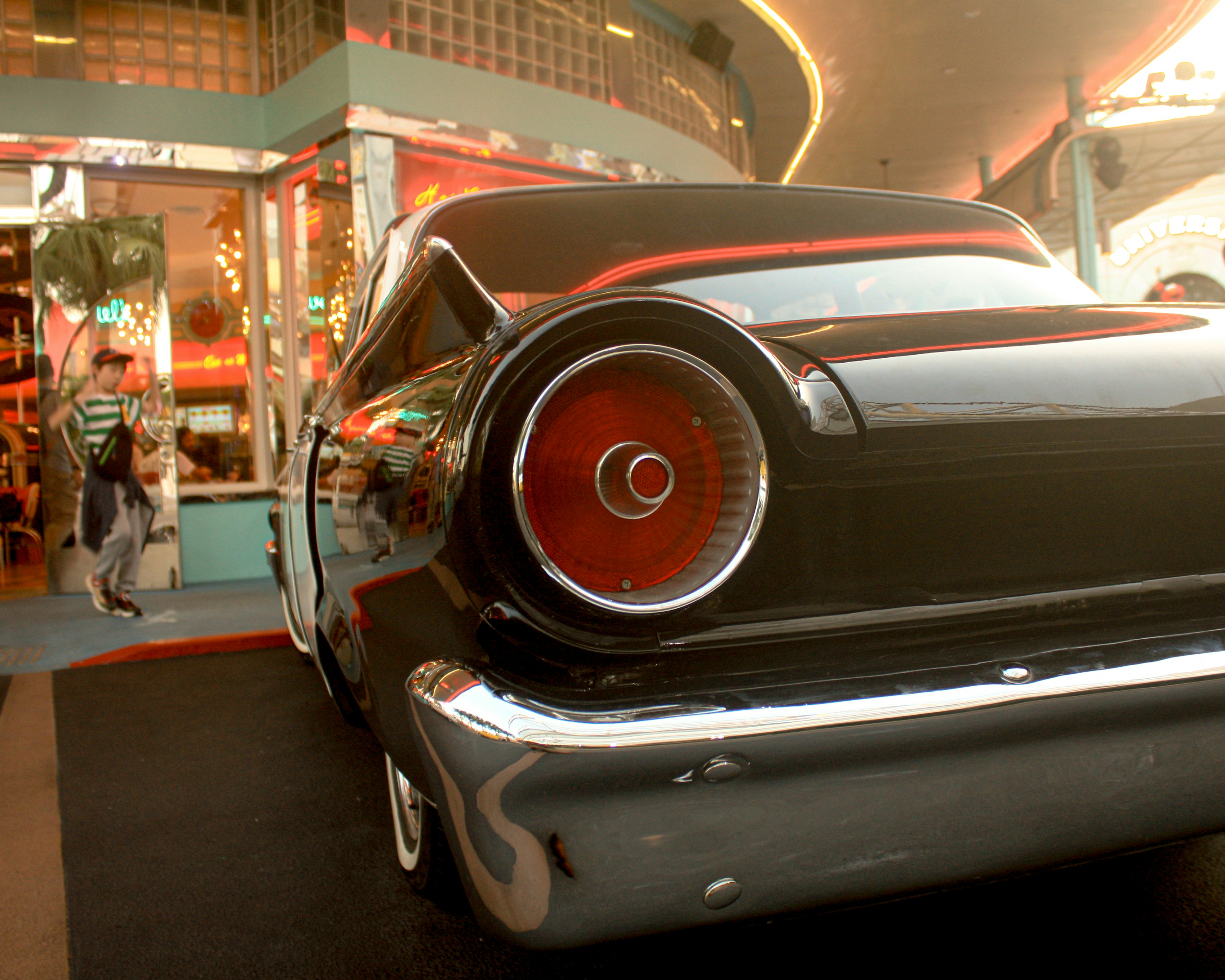 A car is parked in front of a building