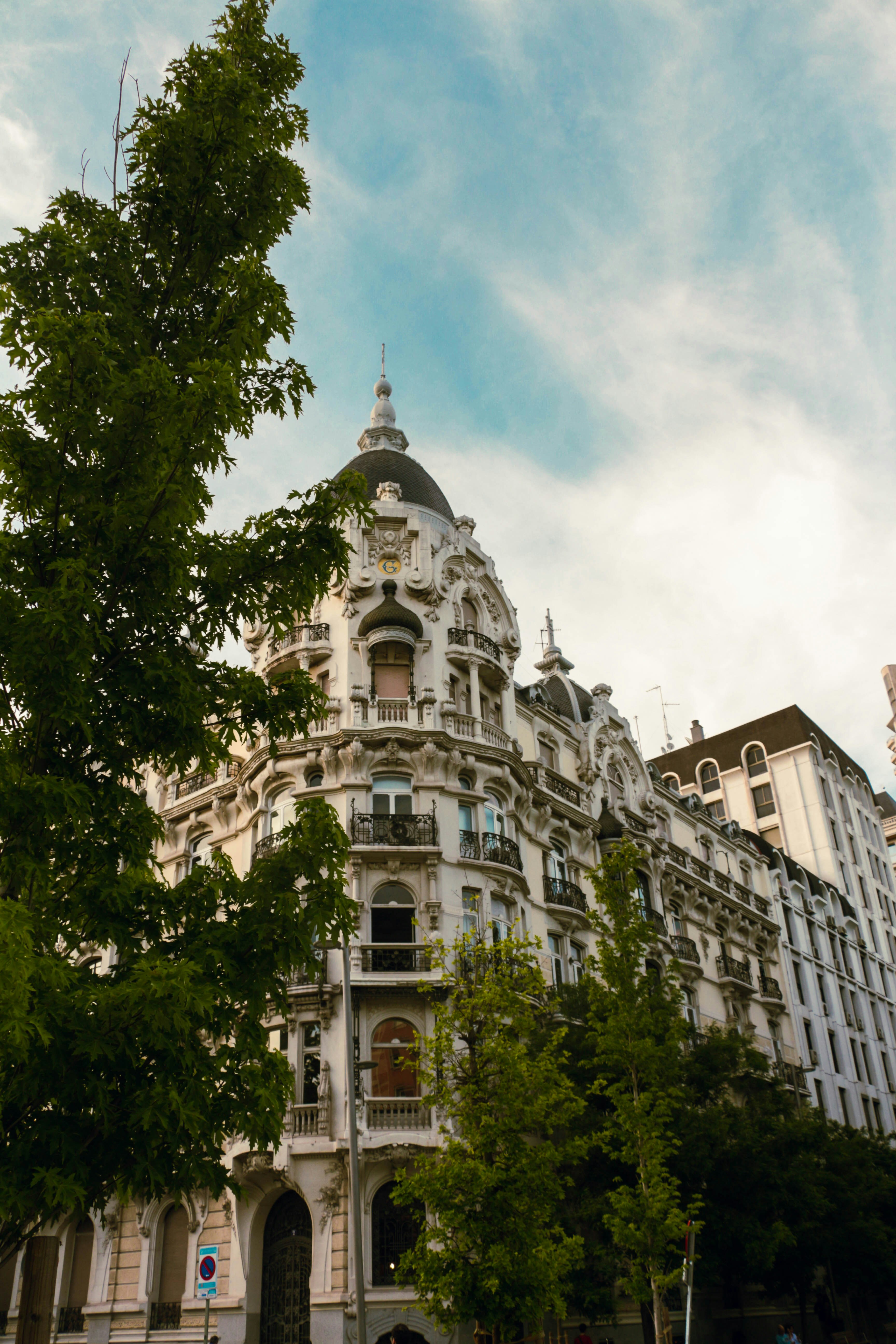 A tall building with a clock on the top of it