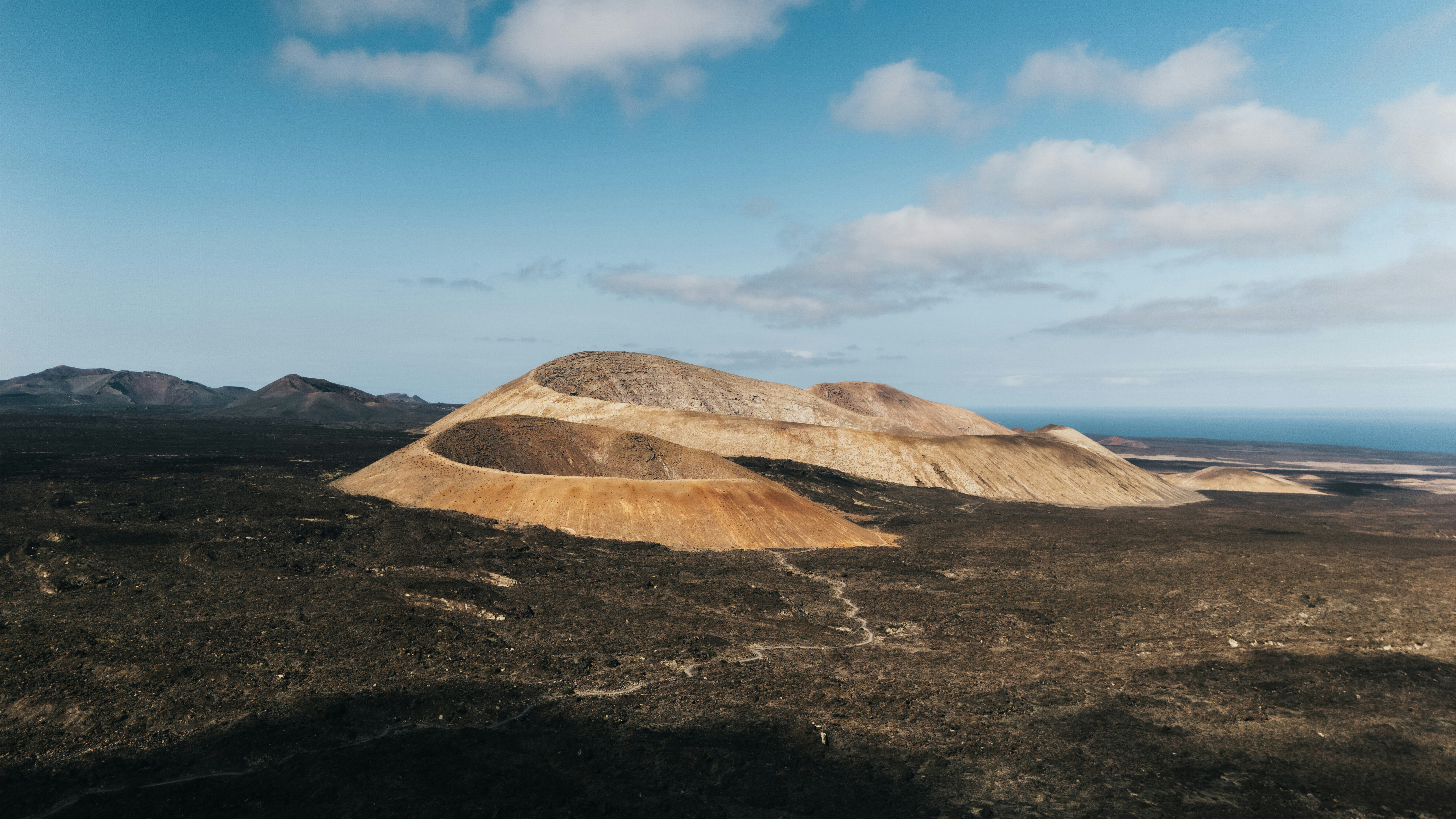 A large hill with some dirt on top of it