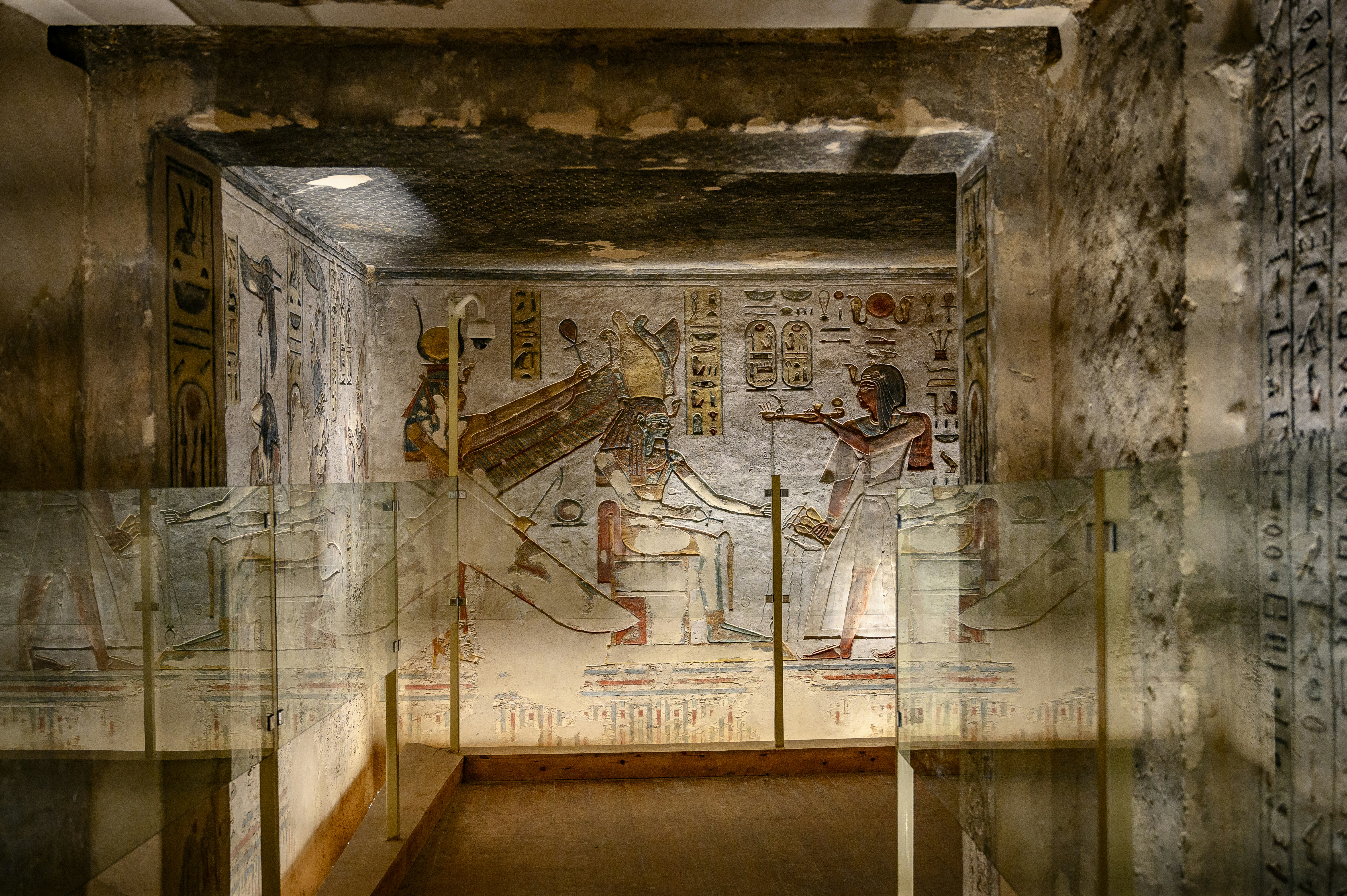 A long hallway with paintings on the walls