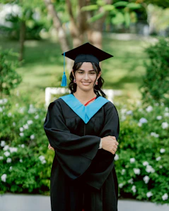 A woman in a graduation cap and gown