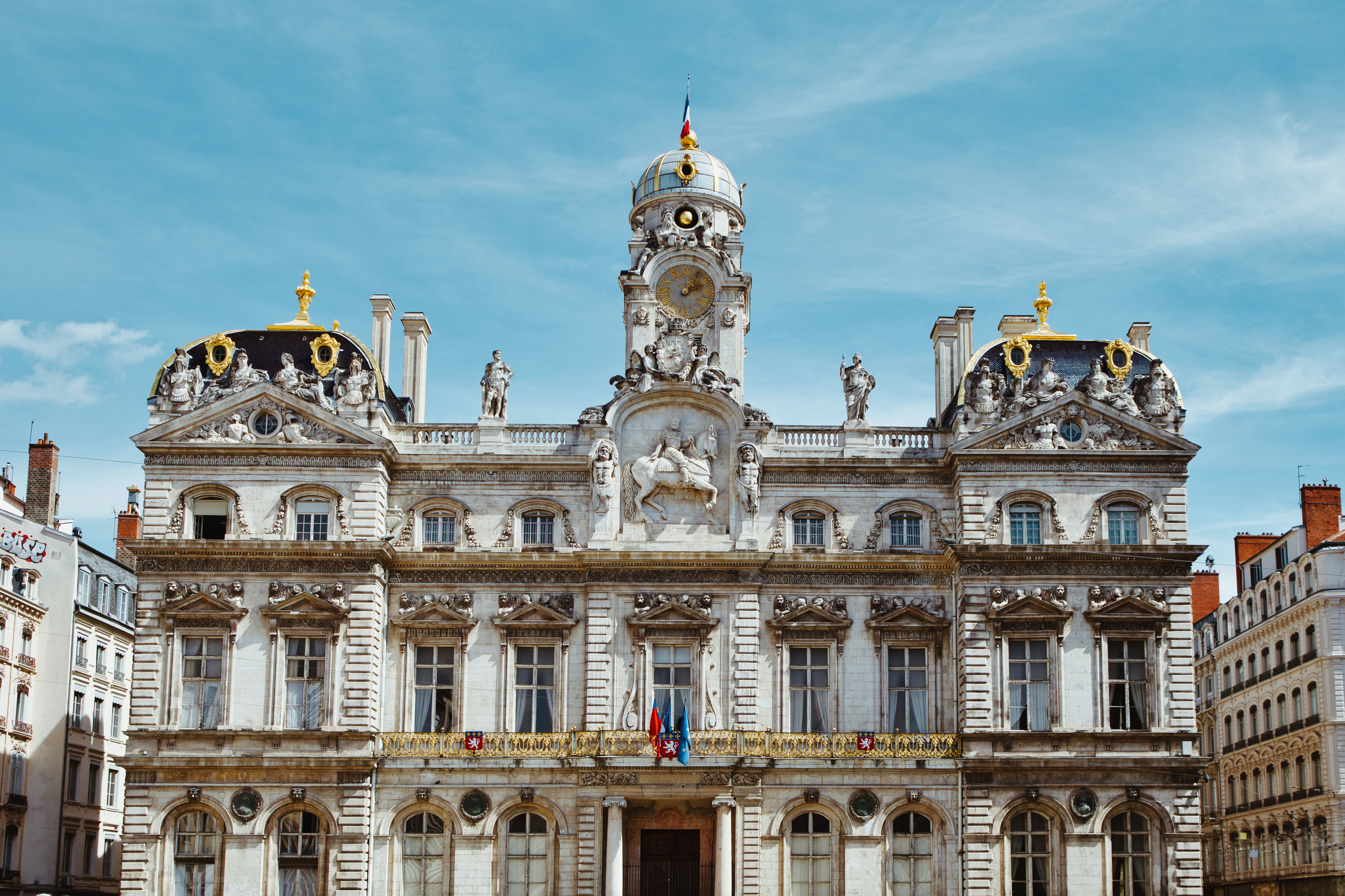 A large white building with a clock tower