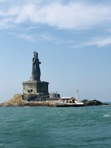 The statue of liberty is in the middle of the ocean