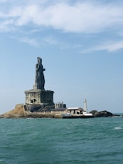 The statue of liberty is in the middle of the ocean