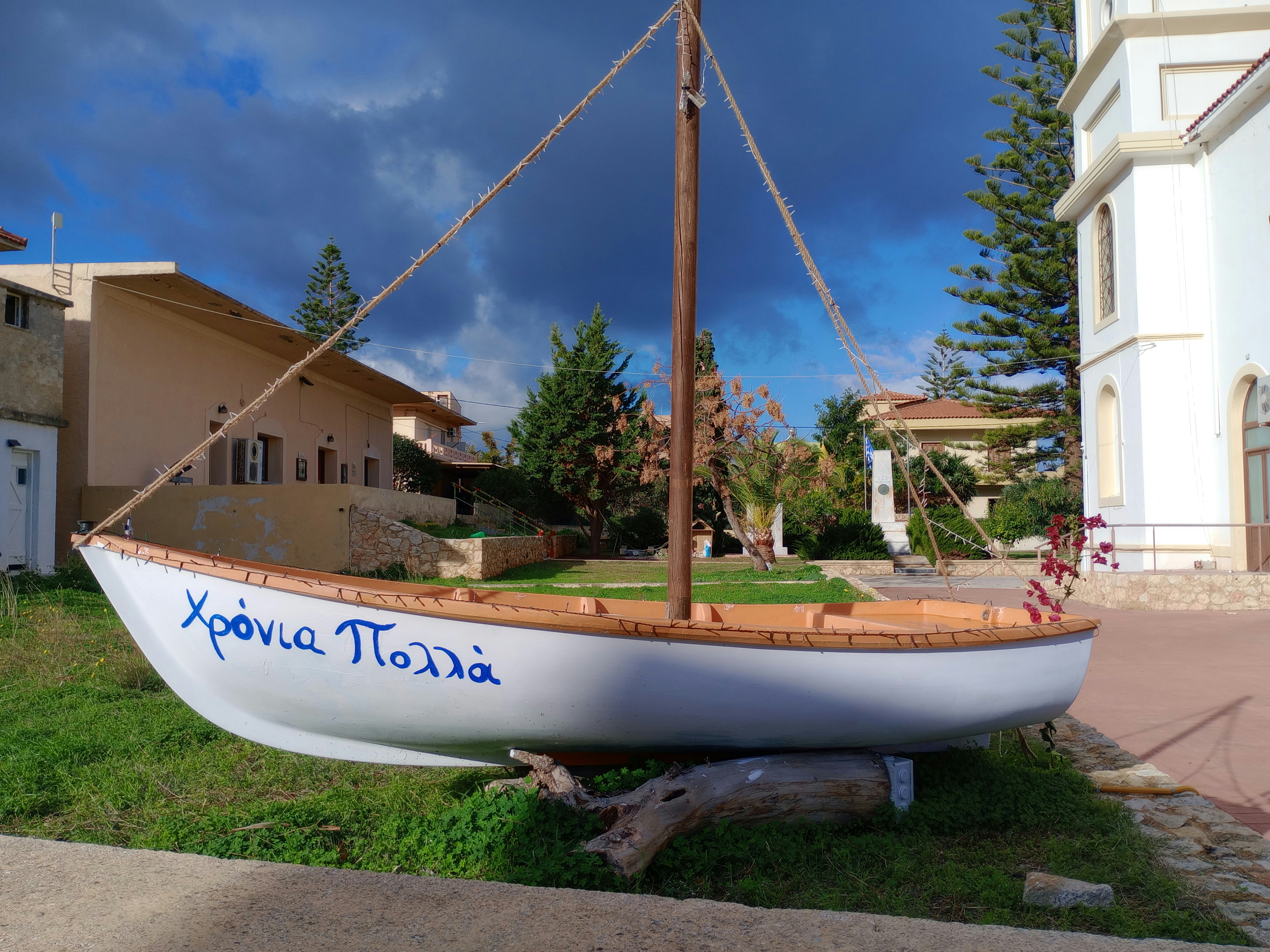 A boat that is sitting in the grass