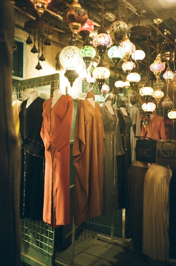 A clothing store with a lot of clothes on display