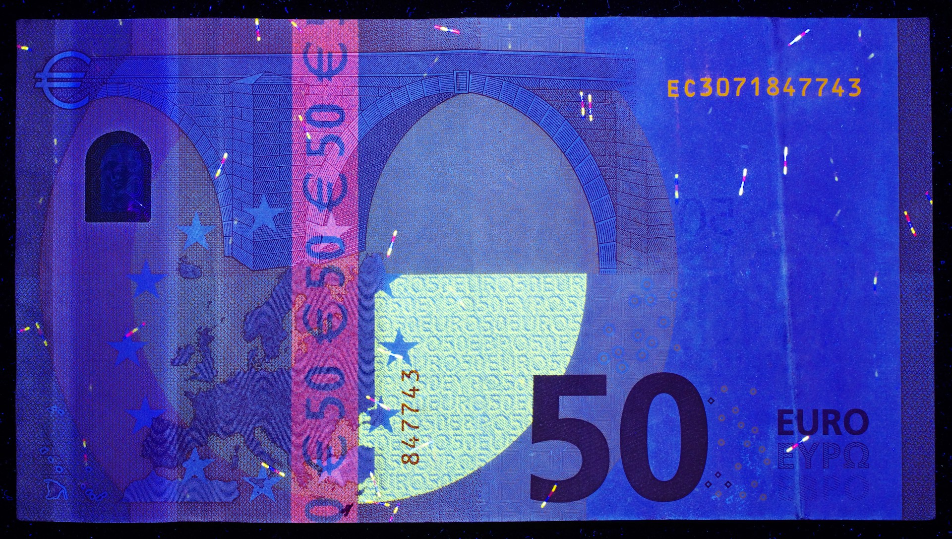 A 50 euros bill with a blue background
