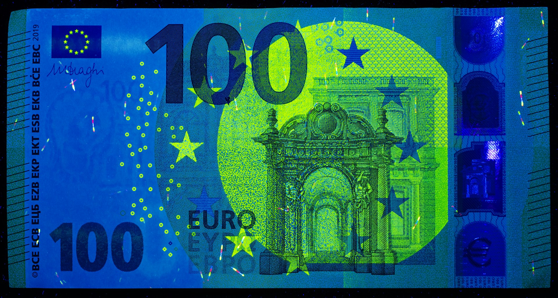 A ten euro bill with a blue background