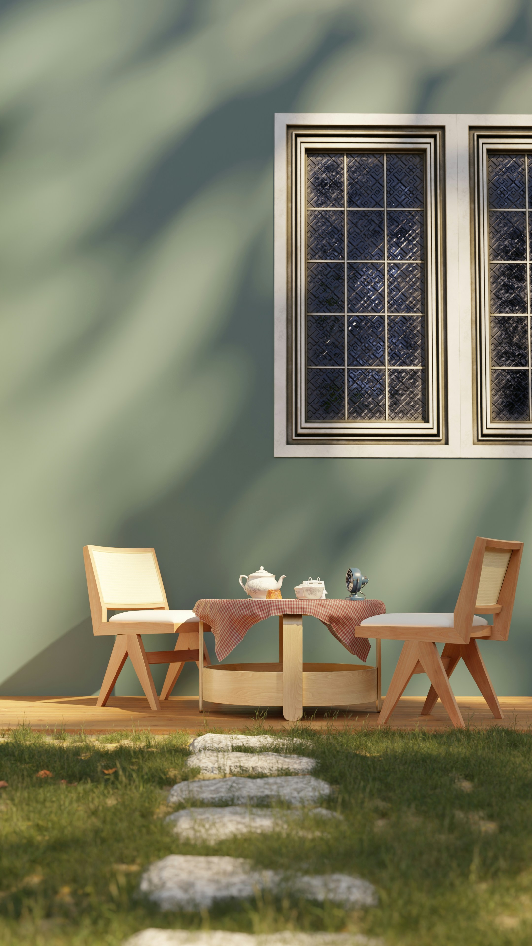 Ein Tisch und Stühle sitzen vor einem Fenster