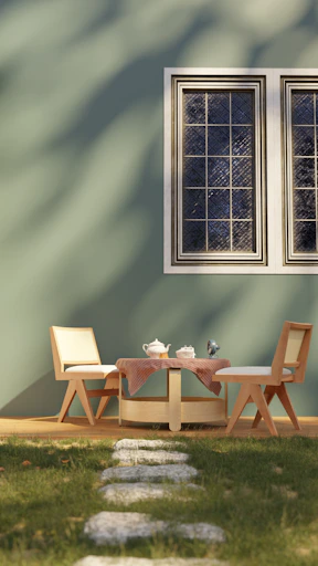 A table and chairs sitting in front of a window