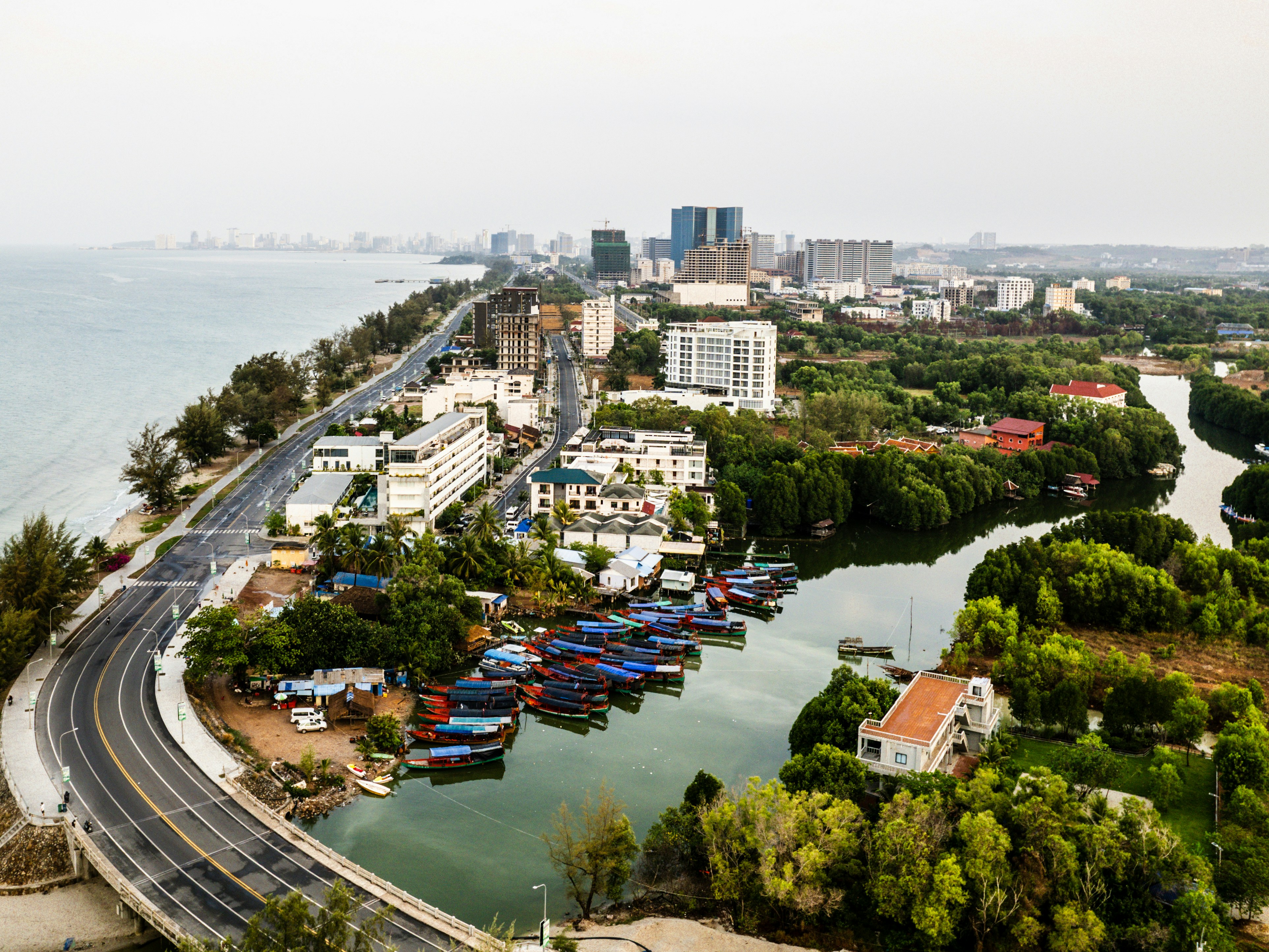 An aerial view of a city by the water