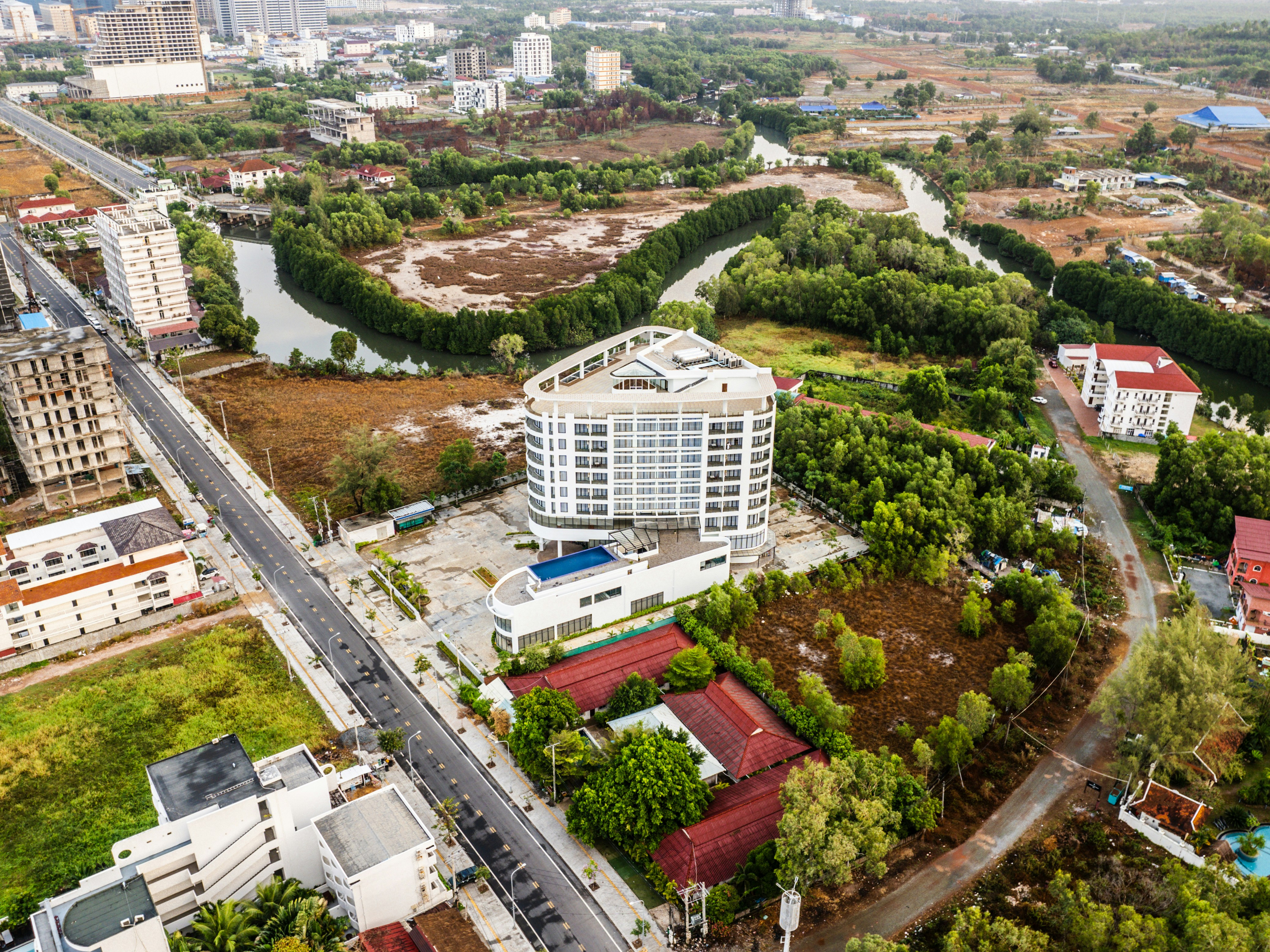 An aerial view of a city with lots of trees
