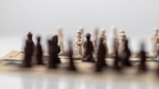 A close up of a chess board with many figures