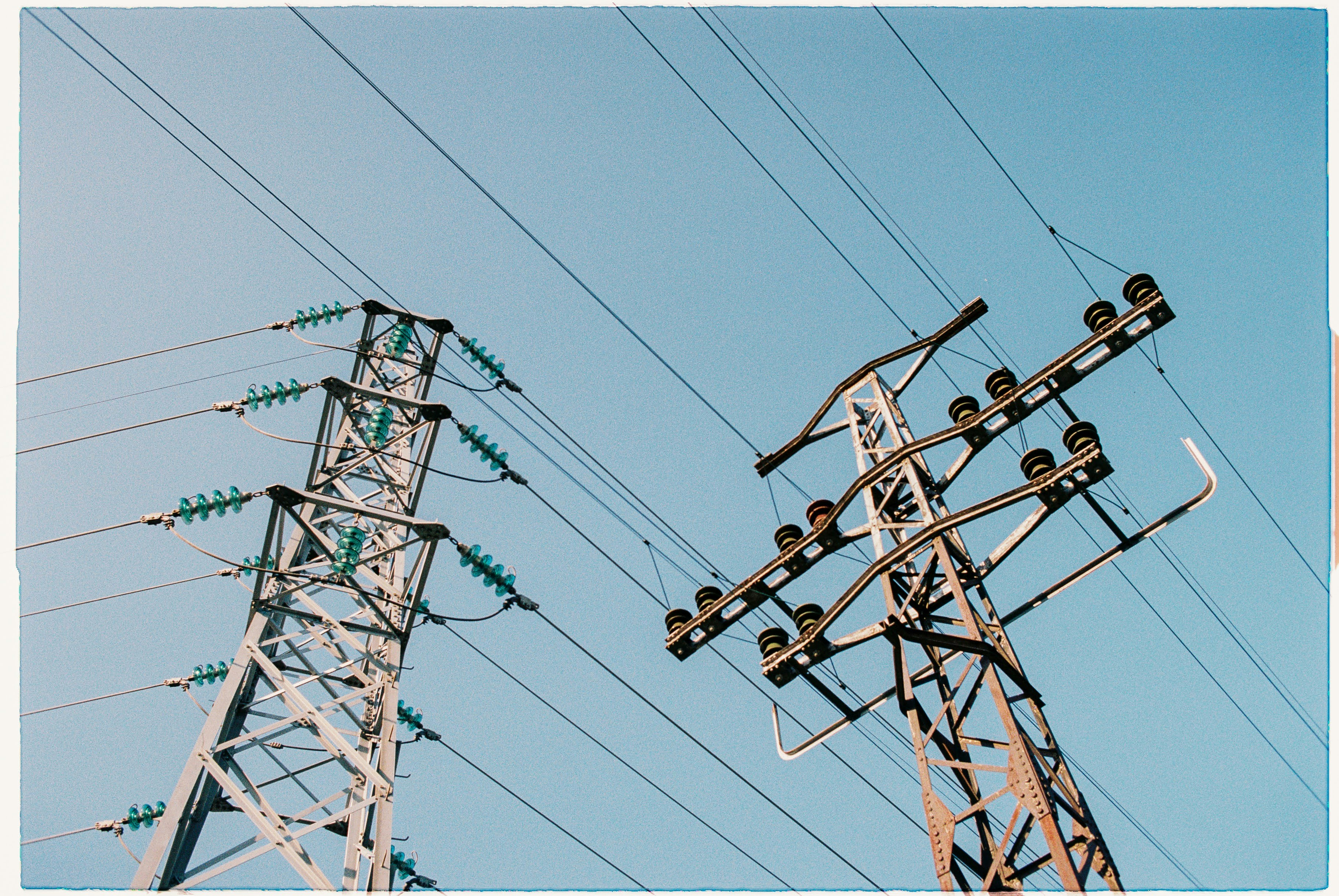 A couple of power lines that are next to each other