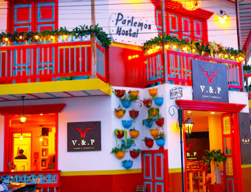A brightly colored building with red and yellow trim