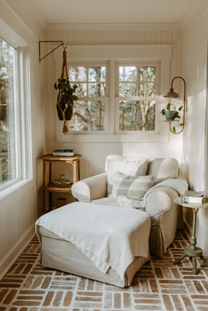 A living room filled with furniture and a window