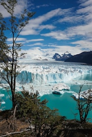 A large glacier in the middle of a body of water