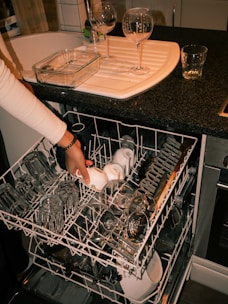 Loading dishes into the dishwasher