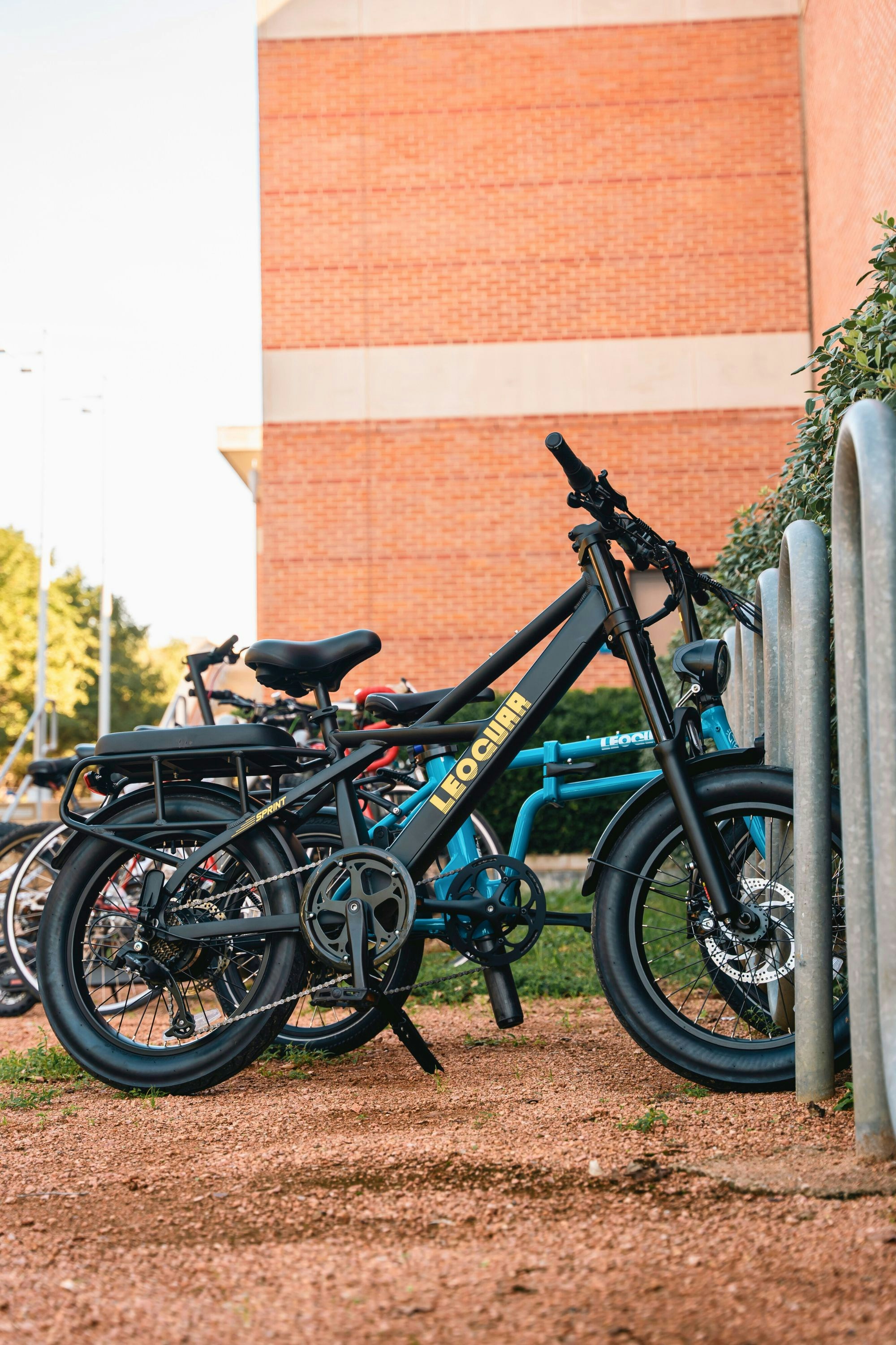 A couple of bikes parked next to each other