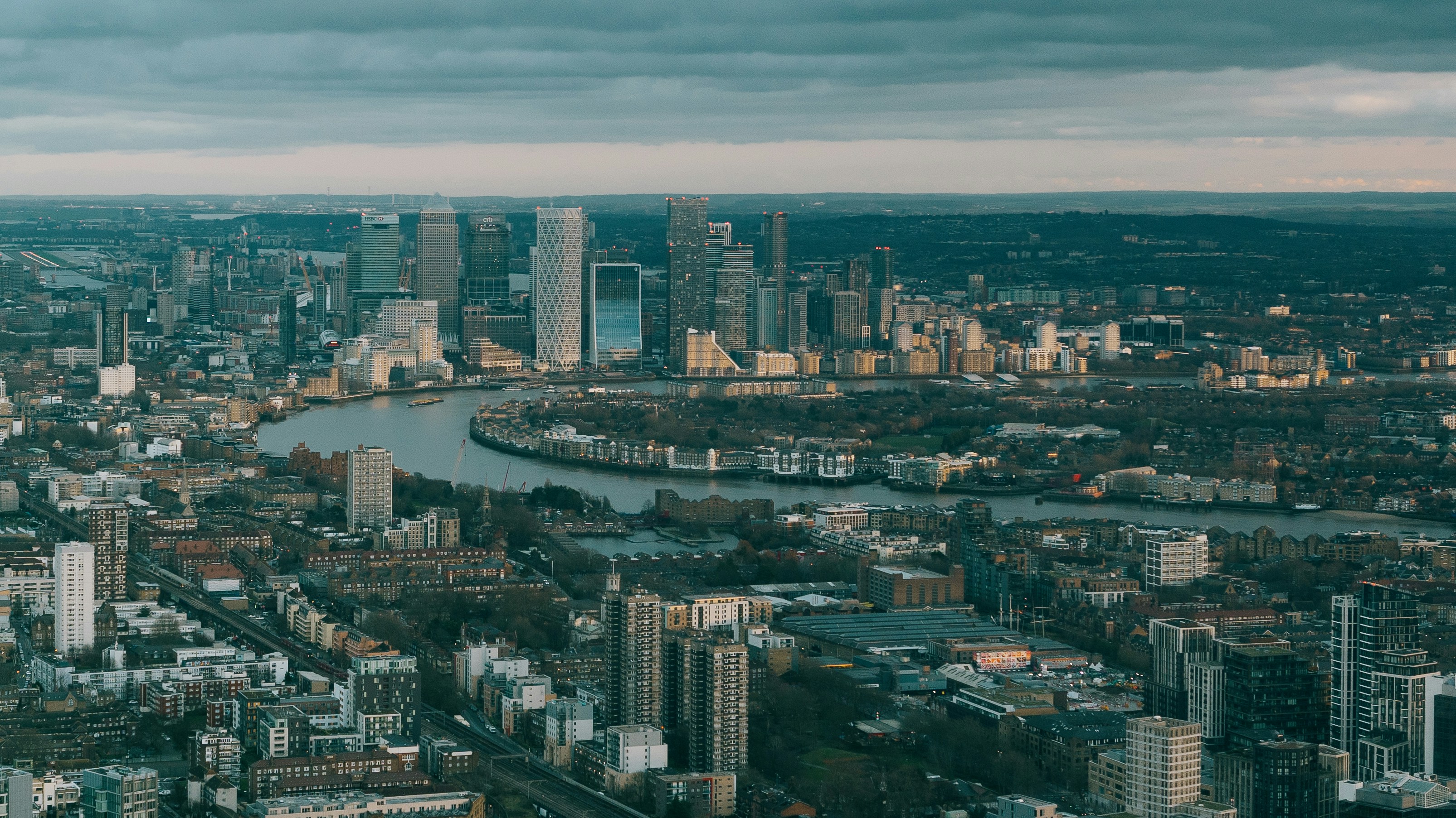 An aerial view of a city with a river running through it photo – Free ...