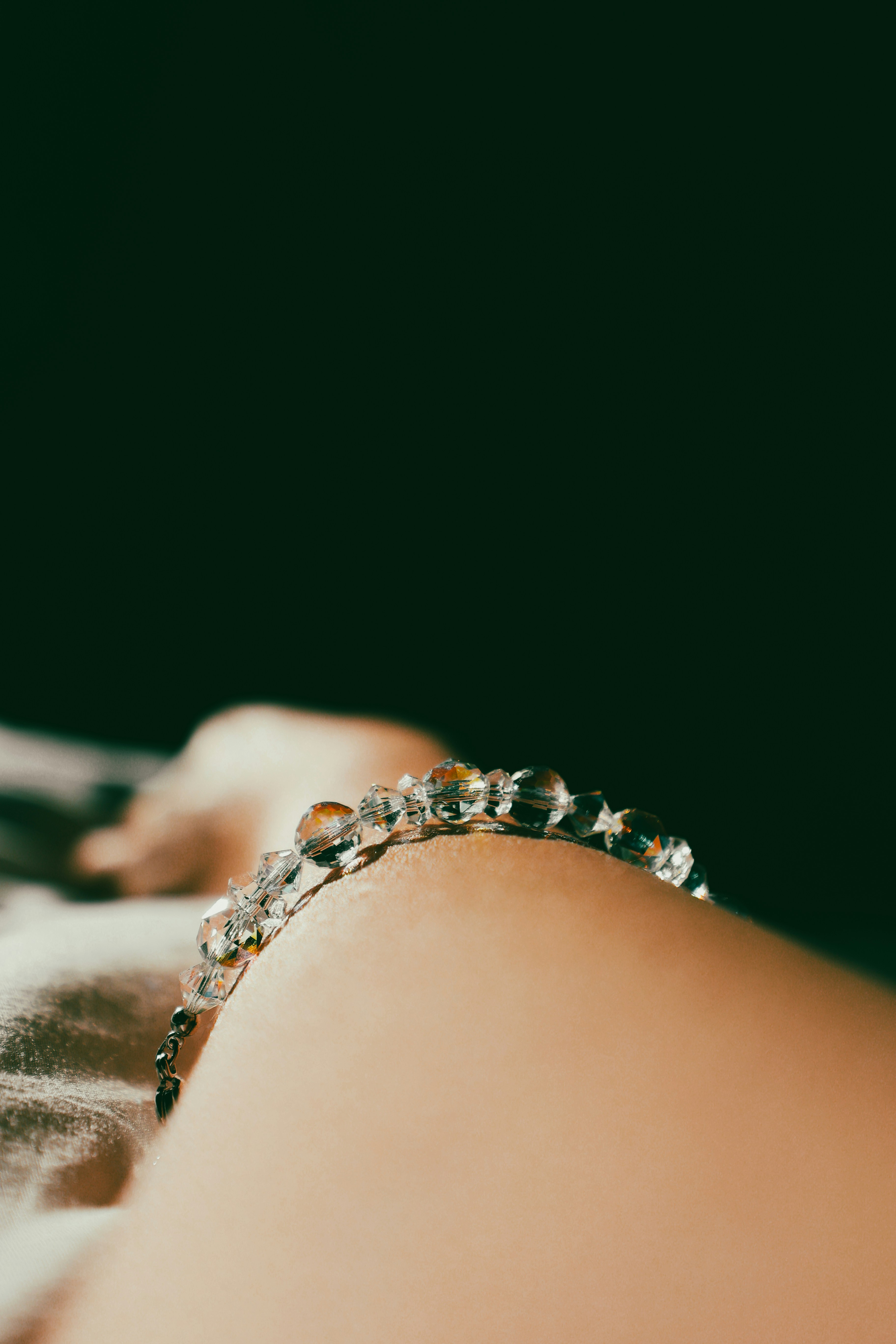 A close up of a person laying on a bed