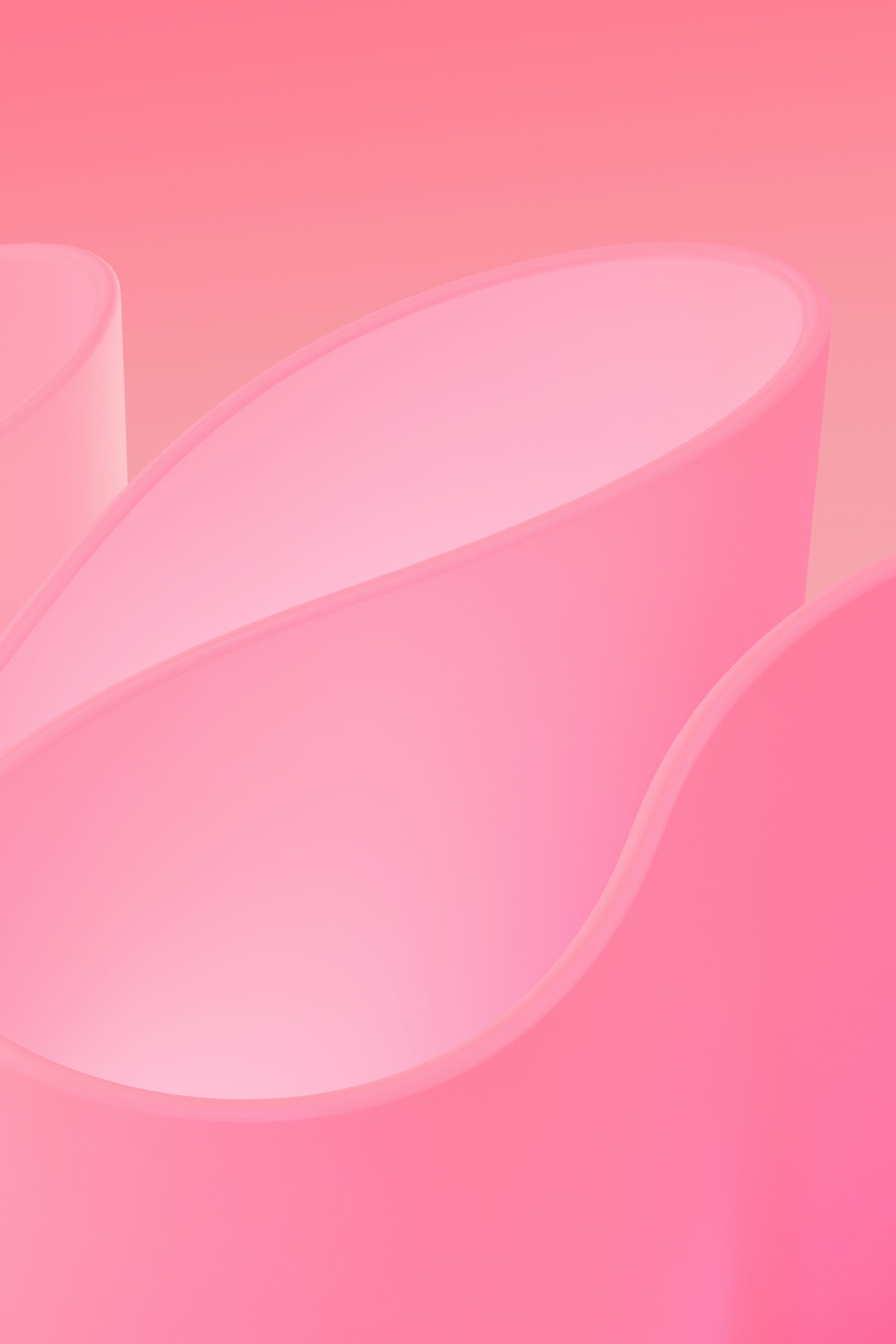 A close up of a pink object on a pink background