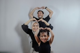 A couple of people that are standing in the air