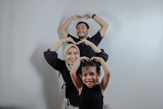 A couple of people that are standing in the air