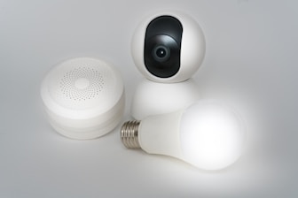A close up of a light bulb and a camera