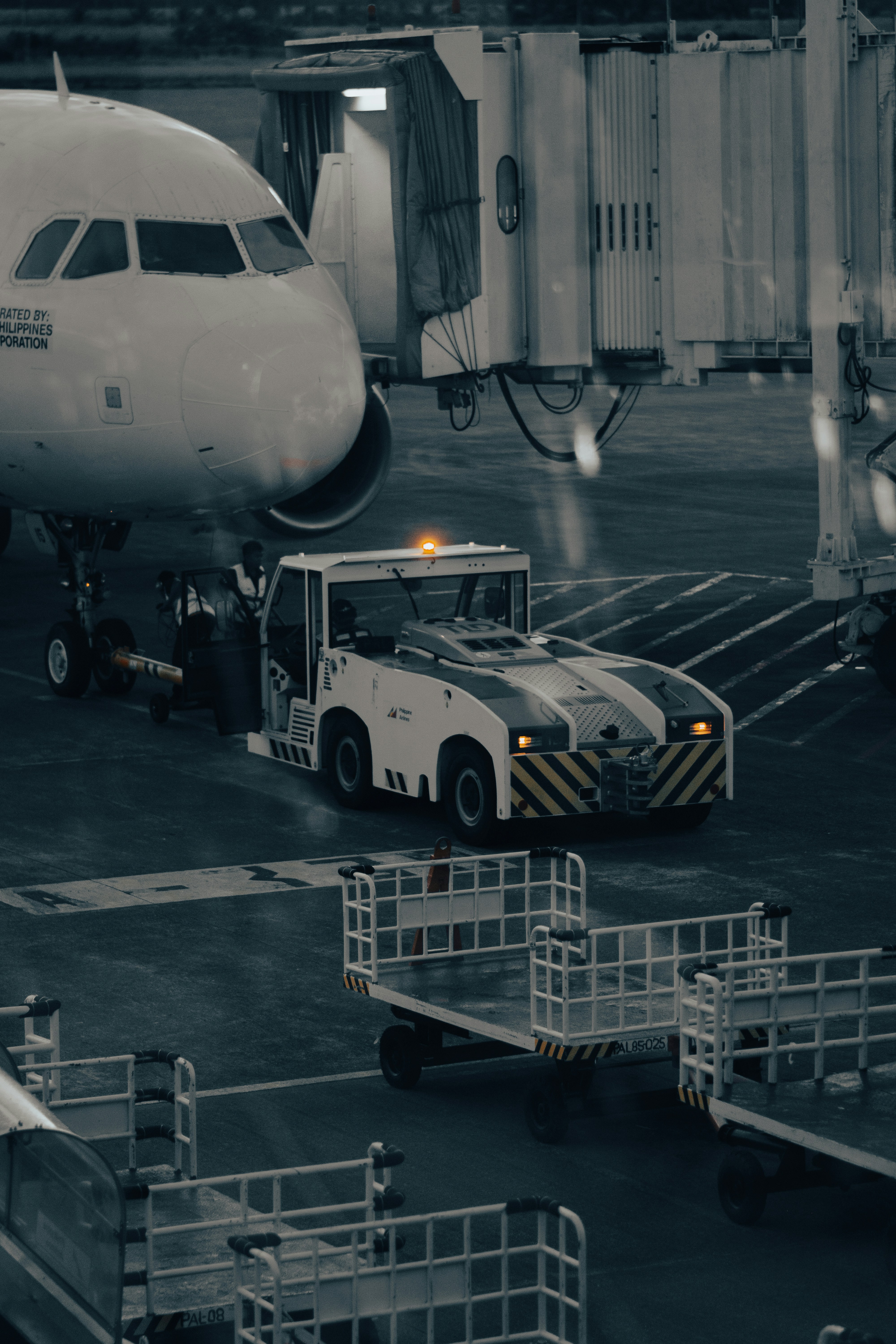 A large jetliner sitting on top of an airport tarmac