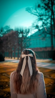A woman with a bow in her hair