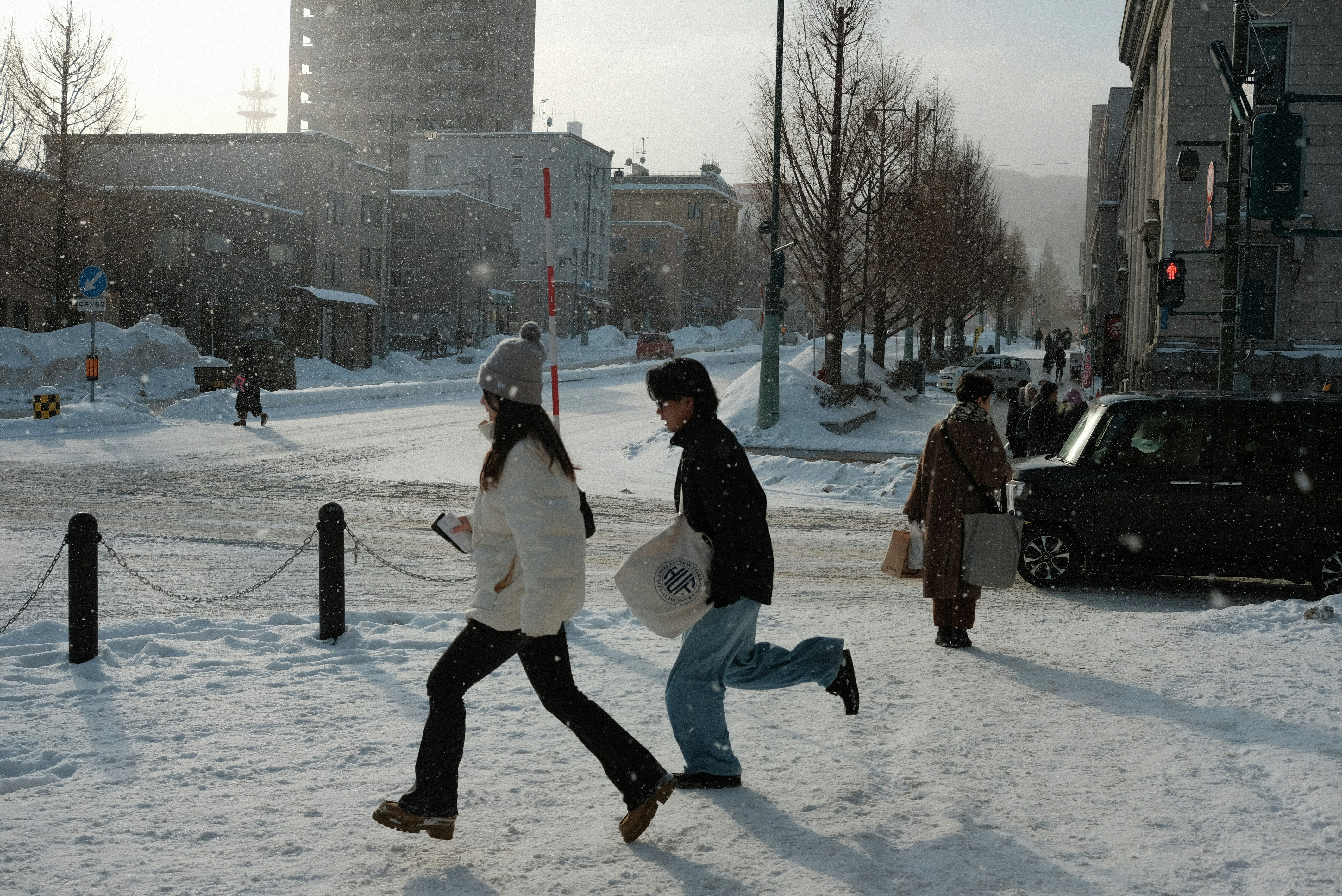Person slipping on icy sidewalk in Japan