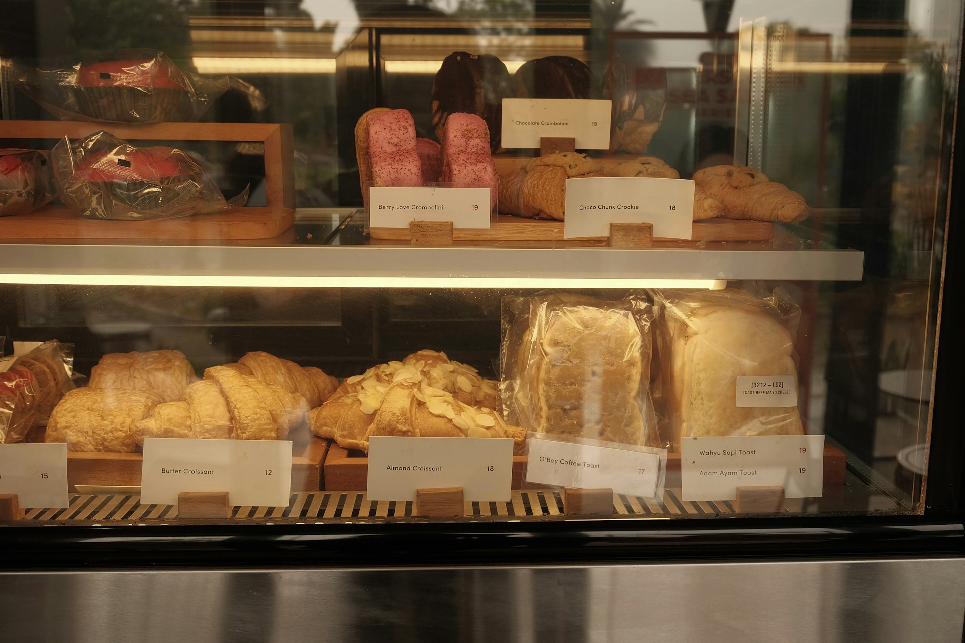 Artisan bread and pastry display at Flour and Ember Bakehouse