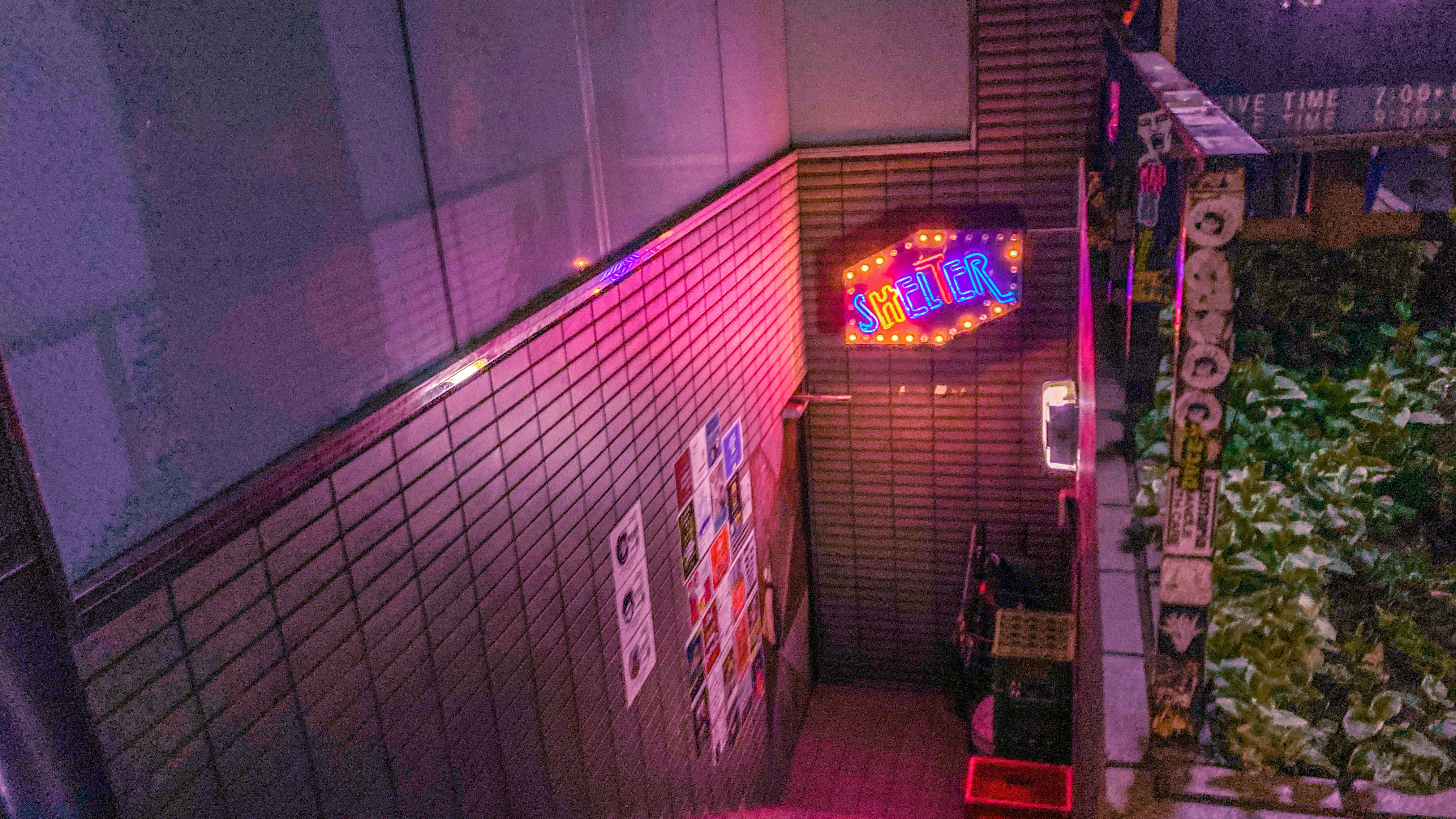 corridor of private booths in a Japanese internet cafe