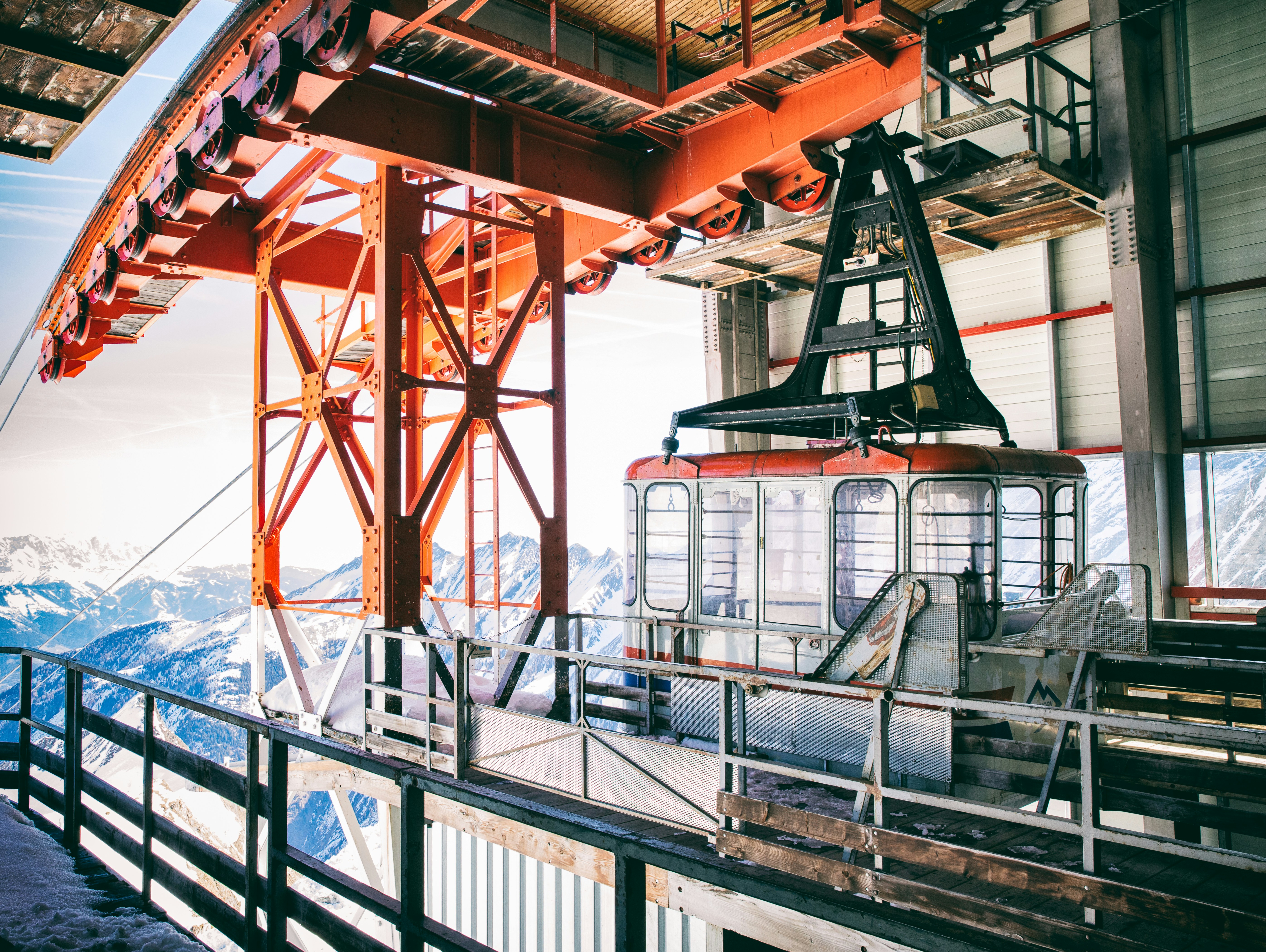 A train on a train track near a building