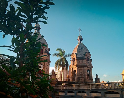 A large building with a cross on top of it — Medellín, Colombia