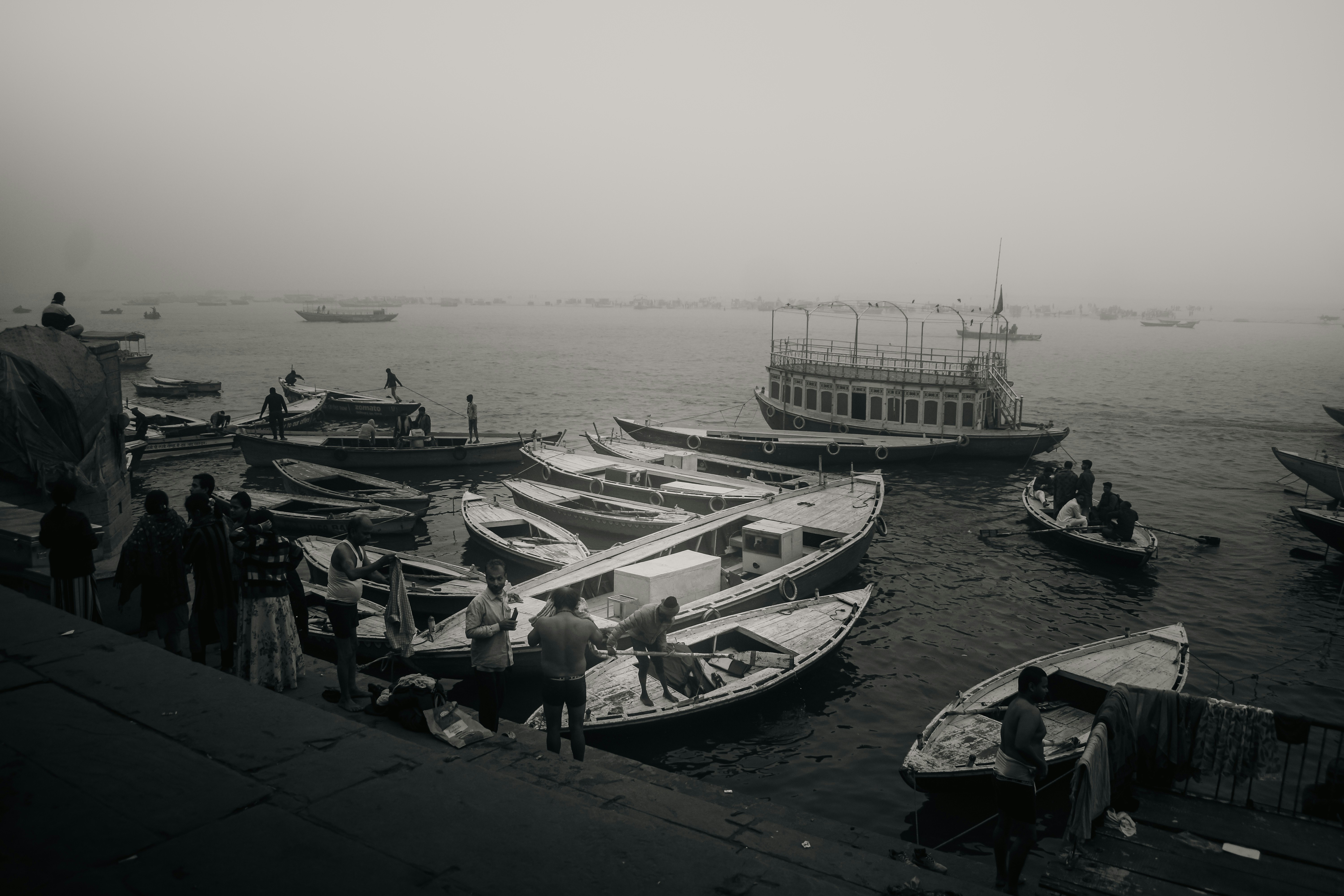 A black and white photo of boats in the water
